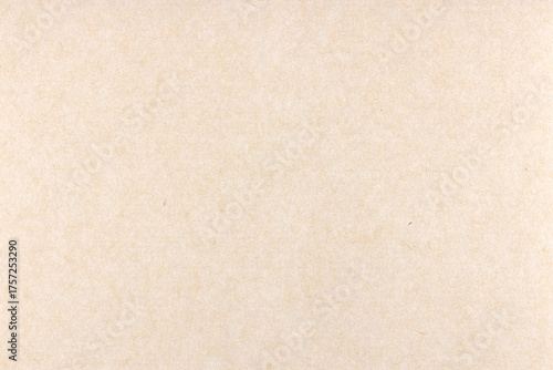 Decorative cream kraft paper texture. Decorated handmade craft paper background. Landscape horizontal orientation.
