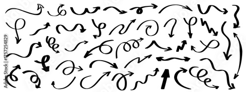 Hand drawn doodle arrow icons collection in various styles (marker, crayon, charcoal), sketch direction lines, unique curved, swirl, and looping arrow design elements for infographics and navigation.