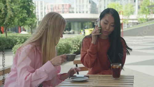 Urban Coffee Break With Friends And Quick Business Call At Outdoor Cafe