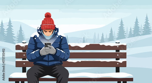 Man Checking Mobile Phone In Winter Landscape Sitting On Bench