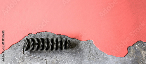 The concrete floor is coral painted. Contractor will paint garage floor to accelerate home sale