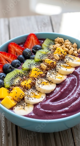 Acai Bowl with Fresh Fruits and Granola Topping on Wooden Table | Healthy Breakfast Food for Nutrition and Wellness Blog, Recipe Website, Smoothie Bowl Marketing