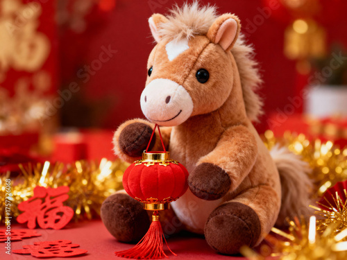 Closeup doll horse baby holding red lantern for new year with new year decoration