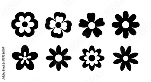 Collection of simple flower silhouettes in black and white, perfect for botanical themes or.