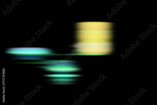 Fototapeta Futuristic glowing teal and yellow orbs over a dark background, symbolizing technology, data, and digital light motion in abstract visual form
