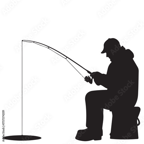 Silhouette of a Man Ice Fishing with Rod and Reel