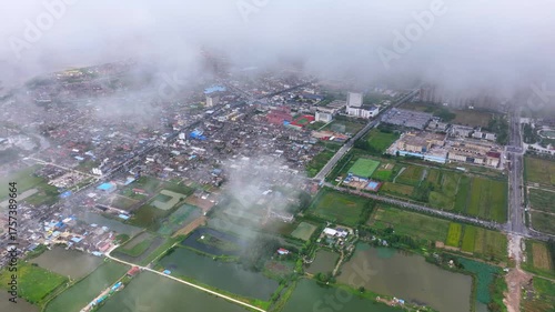‌Aerial View of Coastal Town's Industry-City Integration Landscape‌