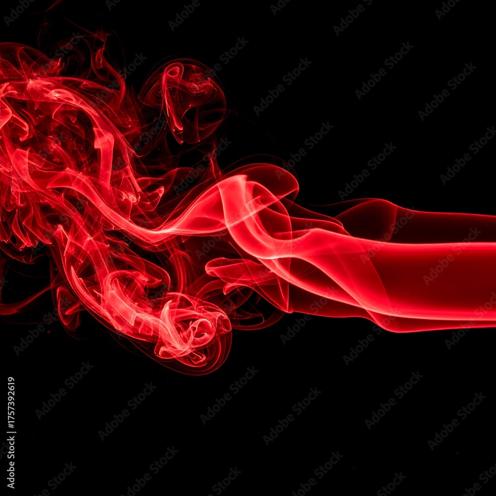 Fototapeta premium A vibrant stream of crimson smoke gracefully curves against a stark black backdrop, creating an elegant and dynamic abstract composition