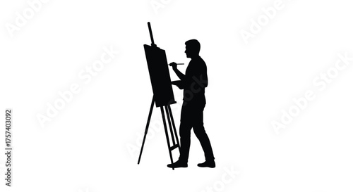 Silhouette of a male artist standing and painting on an easel outdoors creative expression concept silhouette