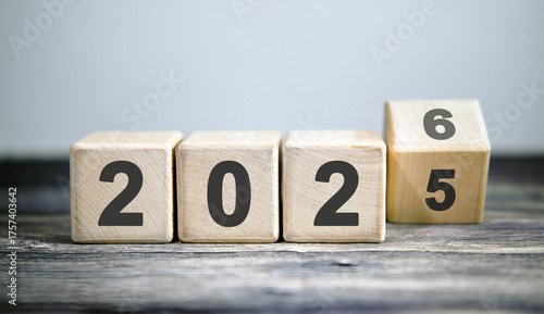 New year 2026 concept. Change of year 2025 to 2026, coup.
