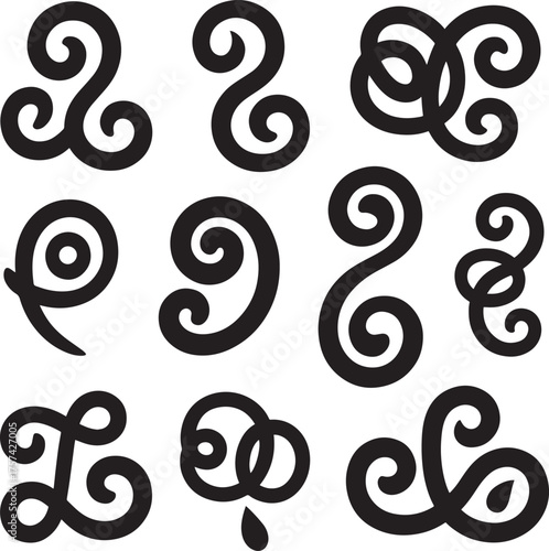 Black swirling decorative elements on white background abstract curves
