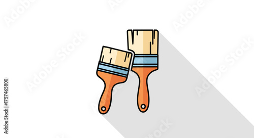 Two clean paint brushes with orange handles and wooden bristles casting a long grey shadow on a white background.