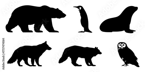 Collection of arctic and antarctic animal silhouettes including a bear penguin seal fox wolf and owl silhouette