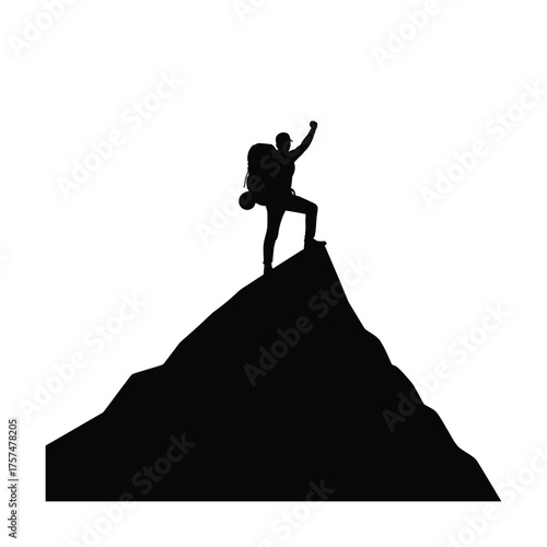 Hiker celebrating on mountain peak silhouette