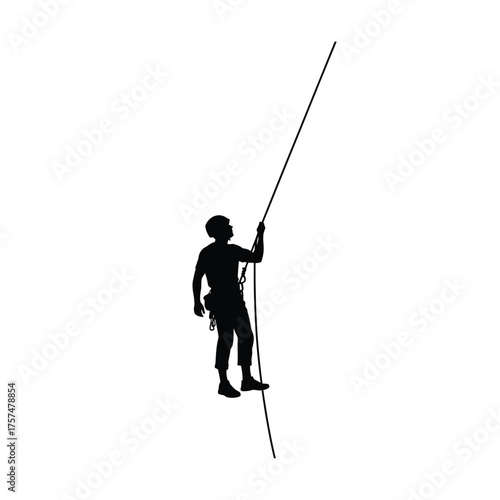 Person rappelling down a steep incline silhouette