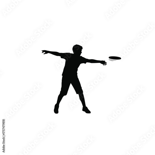 Athlete throwing a disc in silhouette