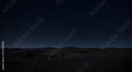 The absolute darkness of a desert night with no moon.