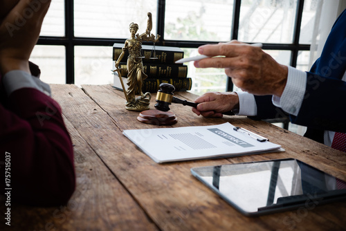 Lawyer discussing contract terms with distressed client