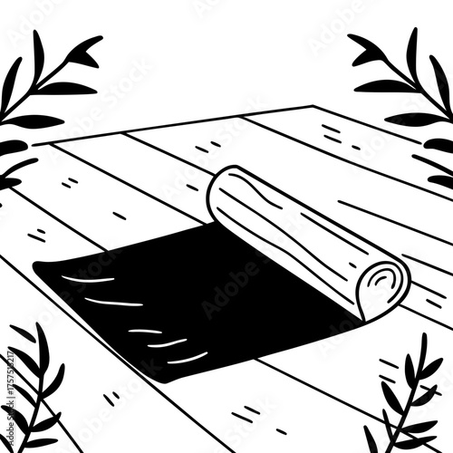 A yoga mat partially unrolled on a wooden floor with foliage in the corners of the composition