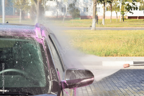 Washing a modern car at a touchless car wash
