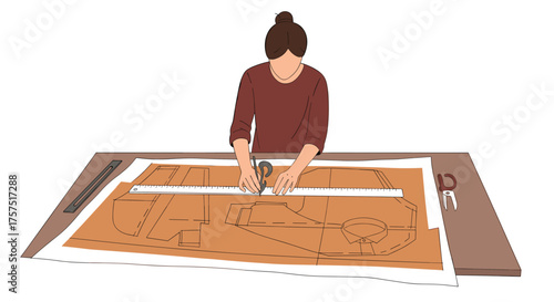 Person cutting fabric using pattern pieces and measuring tools on a large table