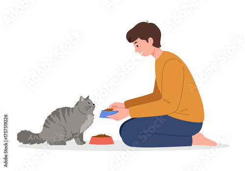 Man Feeding a Gray Cat with Food in a Bowl.