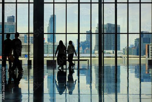 silhouettes of people in airport
