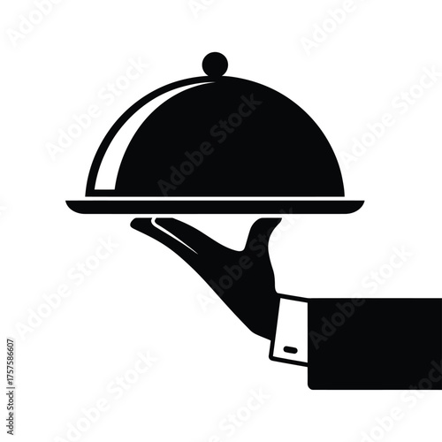 Waiter serving food under a cloche lid