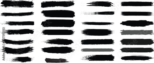 Collection of diverse black paint brush strokes and smears isolated on a white background for artistic design elements