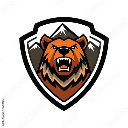 Fierce grizzly bear head emblem with mountain background and shield outline