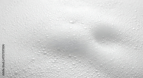 Closeup of white foam texture, isolated on white background
