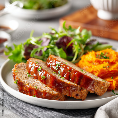 Glazed Meatloaf Slices With Mashed Sweet Potatoes and Fresh Salad