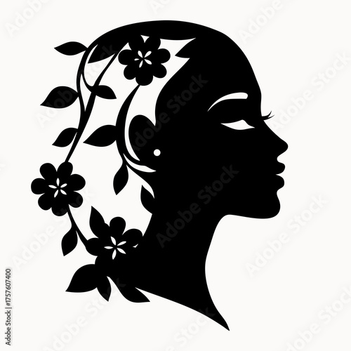 Silhouette of a woman's head with flowers and leaves adorning her hair in a black and white design art