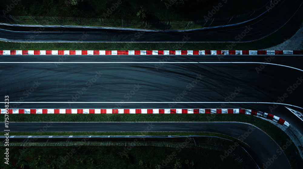 Naklejka premium A Top Down Perspective of a Formula One Car Racing at Speed on a Circuit Track from an Elevated Aerial Vantage Point