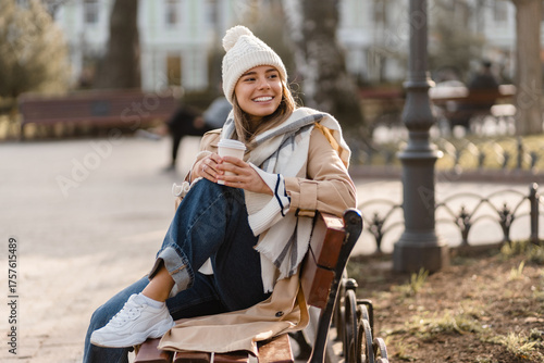 stylish woman walking in winter street
