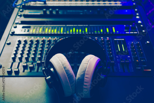 headphone on audio mixer in home studio