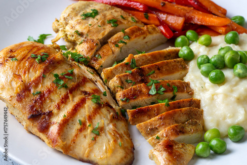 Grilled chicken breast slic...