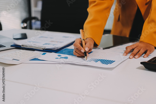 Accounting company provide finance and taxation planning for profitable cash flow, Auditor and accountant team working in office, analyze financial data and accounting record with calculator.Insight