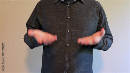 What is the Six Seven 6-7 Slang Trend - Man Demonstrates Popular Hand Gestures