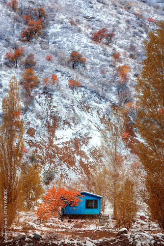 Winter mountain landscape with house near Almaty, Kazakhstan