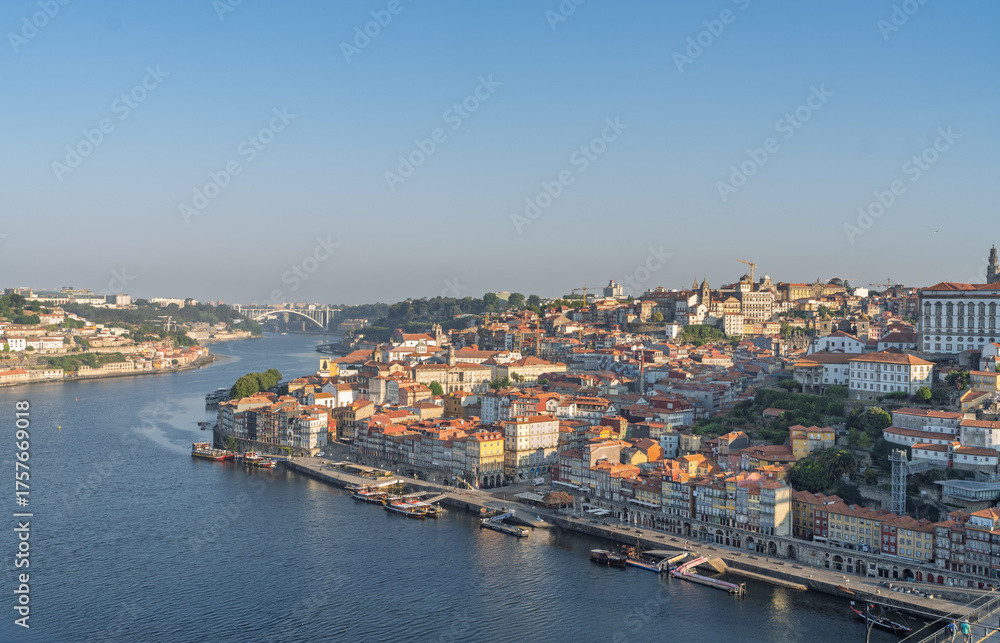 Obraz premium View of Porto city Ribeira District and Douro river. Portugal. Sunrise Light