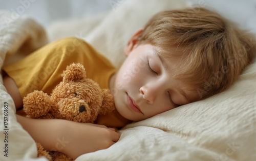 Child Sleeping Peacefully With a Teddy Bear in a Cozy Bedroom Setting During ...
