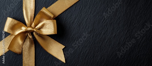 Elegant Golden Ribbon on a Dark Surface Ready for Special Occasion Gift Wrapping