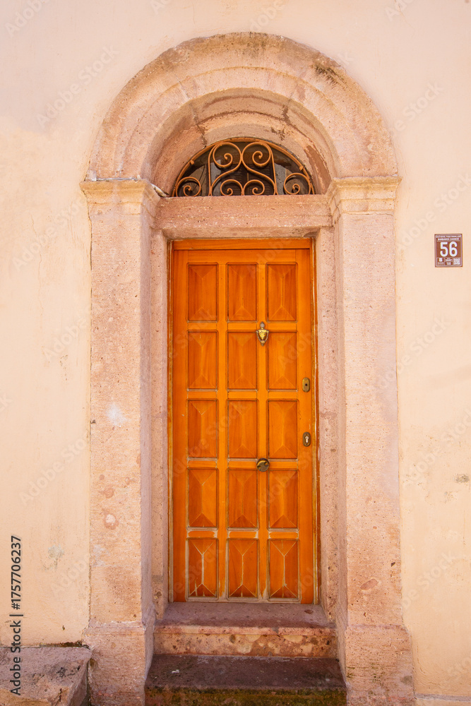 Fototapeta premium Colorful decorative doors of old houses in the streets of Ayvalik city center. Ayvalik - Turkey