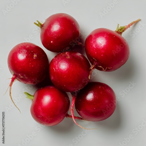Fresh Red Radishes Grouped Together on a Light Surface Perfect for Salads and...