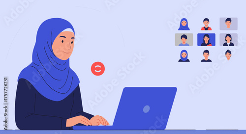 A focused young Muslim woman wearing a blue hijab actively participates in a virtual video conference call on her laptop, connecting with diverse online colleagues.