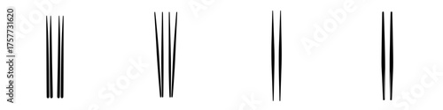 Chopsticks arranged in pairs demonstrating traditional Asian dining utensils at a restaurant table setting