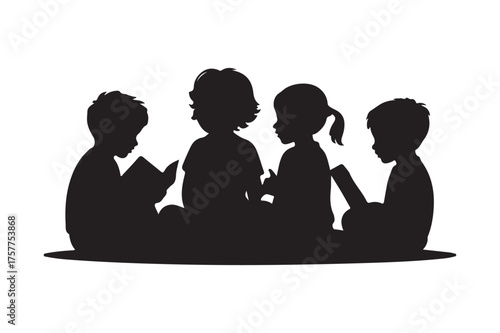 Silhouette of children reading books together outdoors