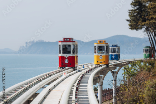 Obraz na płótnie Haeundae Blue Line Park, Busan, ride on multicoloured sky capsule train, railway