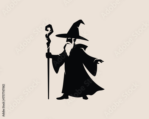 Silhouette of a wizard with a pointed hat and staff against a plain background